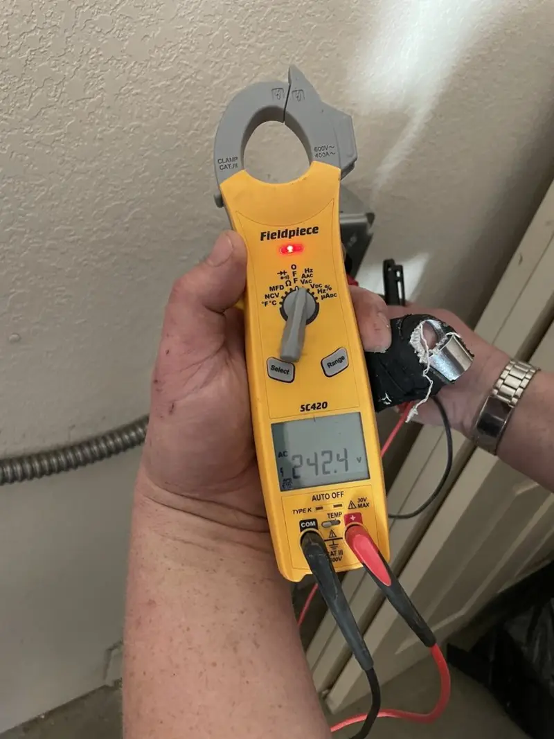 Voltage testing with clamp meter during Outlet Installation in Ocean City
